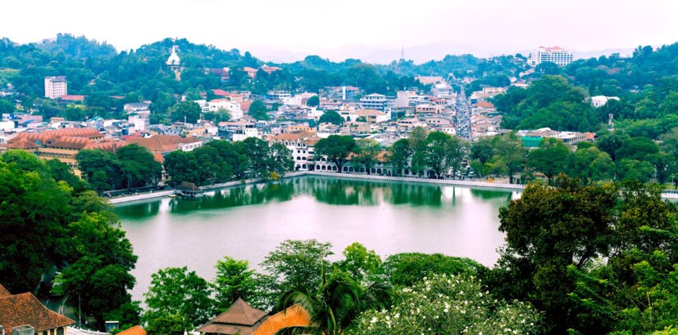 A picturesque view of Kandy city with its lush landscapes and serene lake, Sri Lanka.
